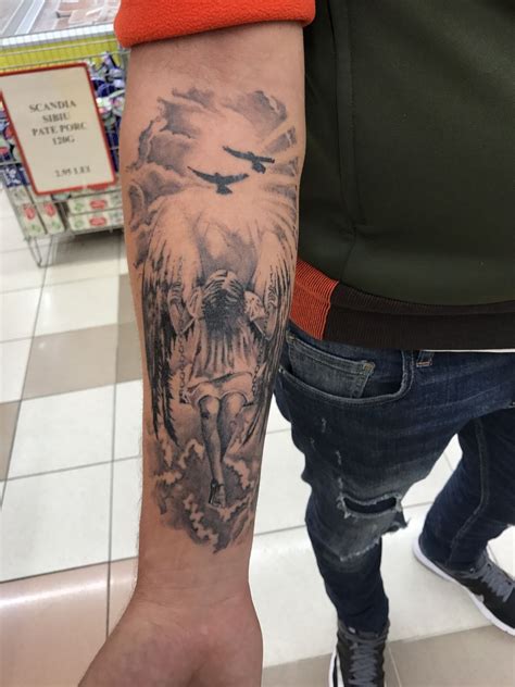 forearm guardian angel tattoos|pictures of guardian angels tattoos.